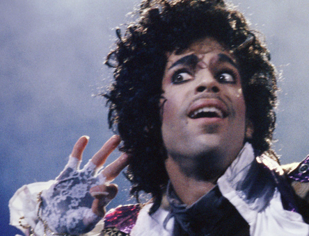 The artist Prince performing Purple Rain